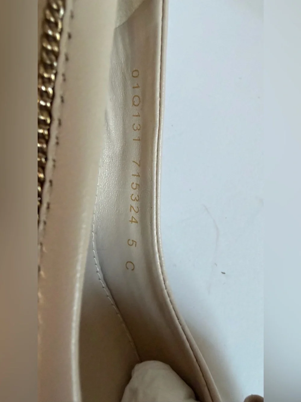 Salvatore Ferragamo Cream Vara Bow Flats with Gold Chain Accent
